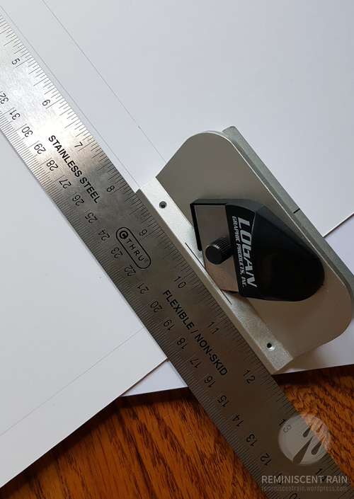 Line up your mat cutter and ruler along the guide lines you created.